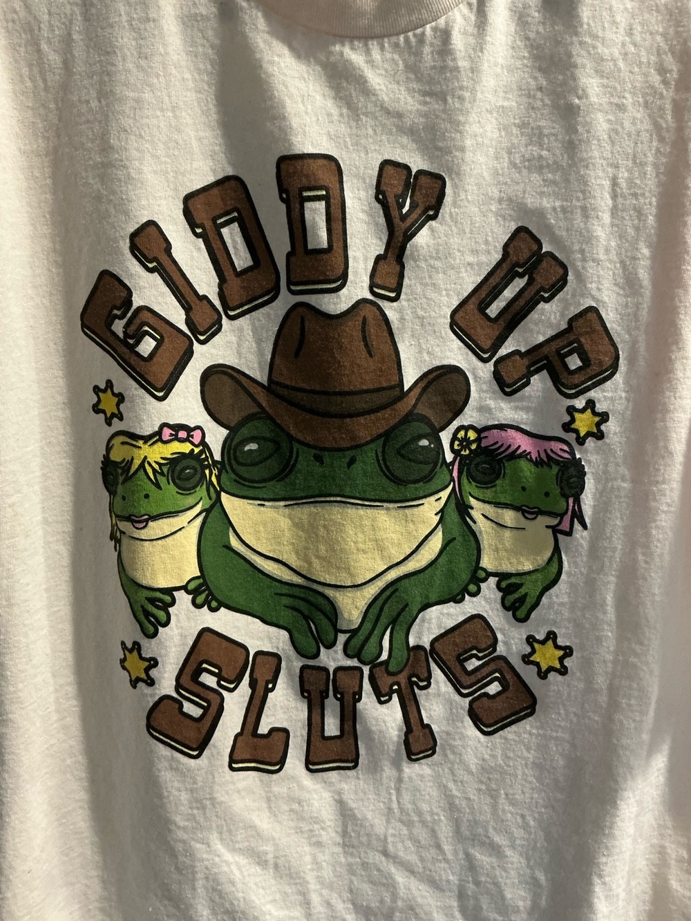 White Frog Cowboy Graphic Tee - giddy up sluts